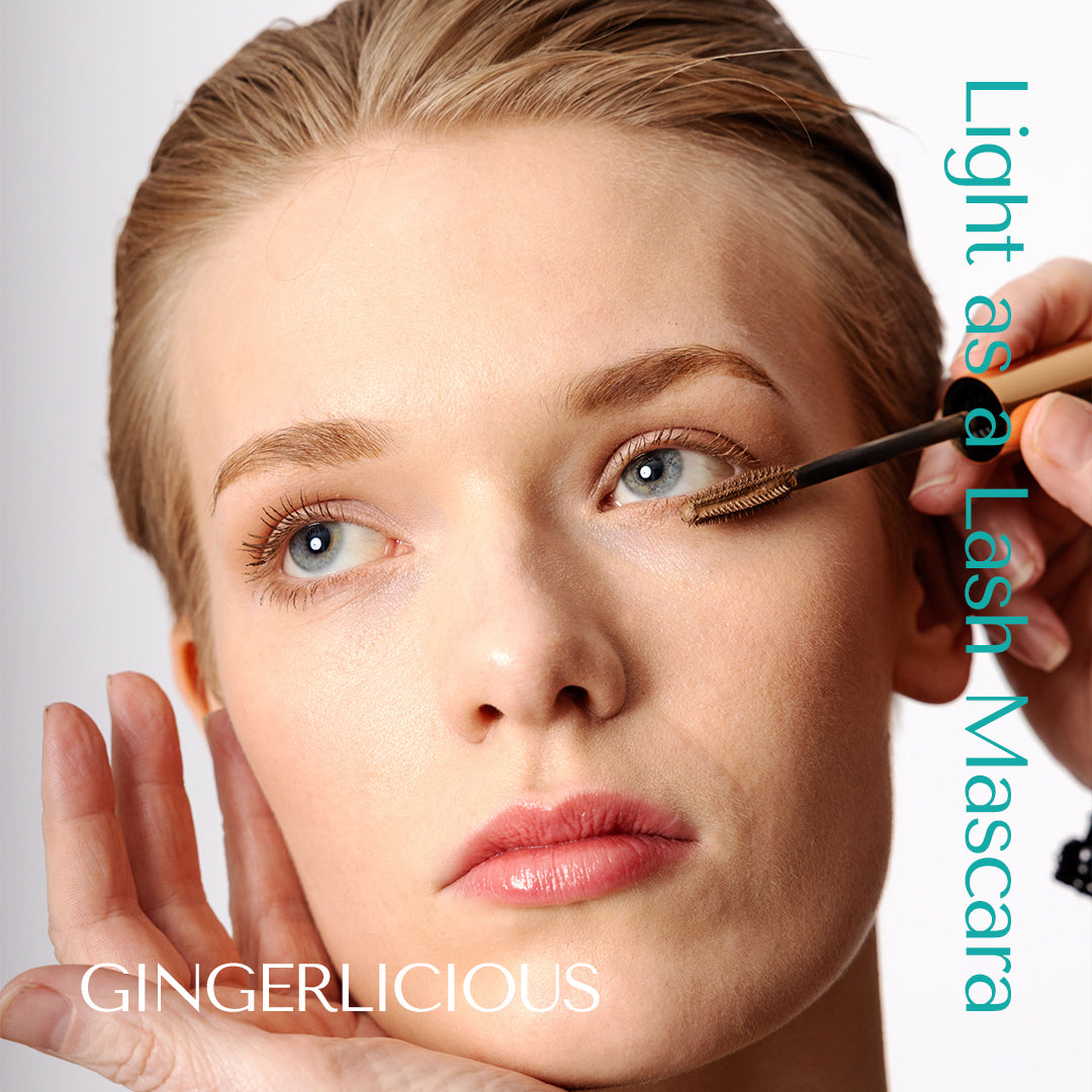 Ash Blond model wearing light as a lash mascara in the shade Gingerlicious. Gingerlicious mascara suits blonde lashes, clear lashes, red lashes, light lashes, grey lashes, white lashes. Vegan. Made in Denmark. 