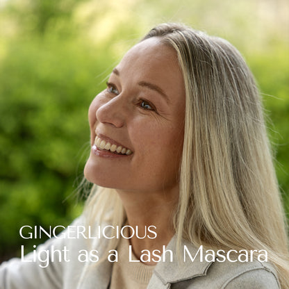 Blonde Hey Redhead Model wearing Gingerlicious. Blonde woman wearing Light as a Lash Mascara on eyelashes and eyebrows. Mascara for blondes and ashblond and red hair. 