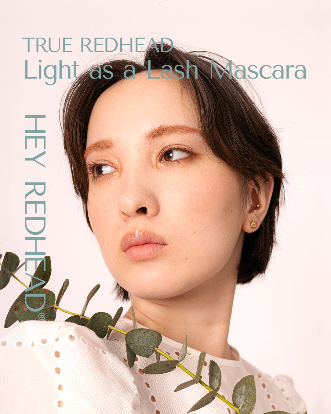 Light as a Lash Mascara on Asian woman with creative make-up. True Redhead from HEY REDHEAD is a gentle mascara that fits anyone and all types who wants a softer look. Danish-vietnamese with freckles.
