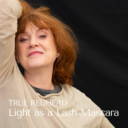 The bestselling authour Jacky collis harvey. A history of the redhead. My life as a redhead. Jacky poses with true redhead mascara from light as la lash mascara from hey redhead. Jacky is from the uk. role model 